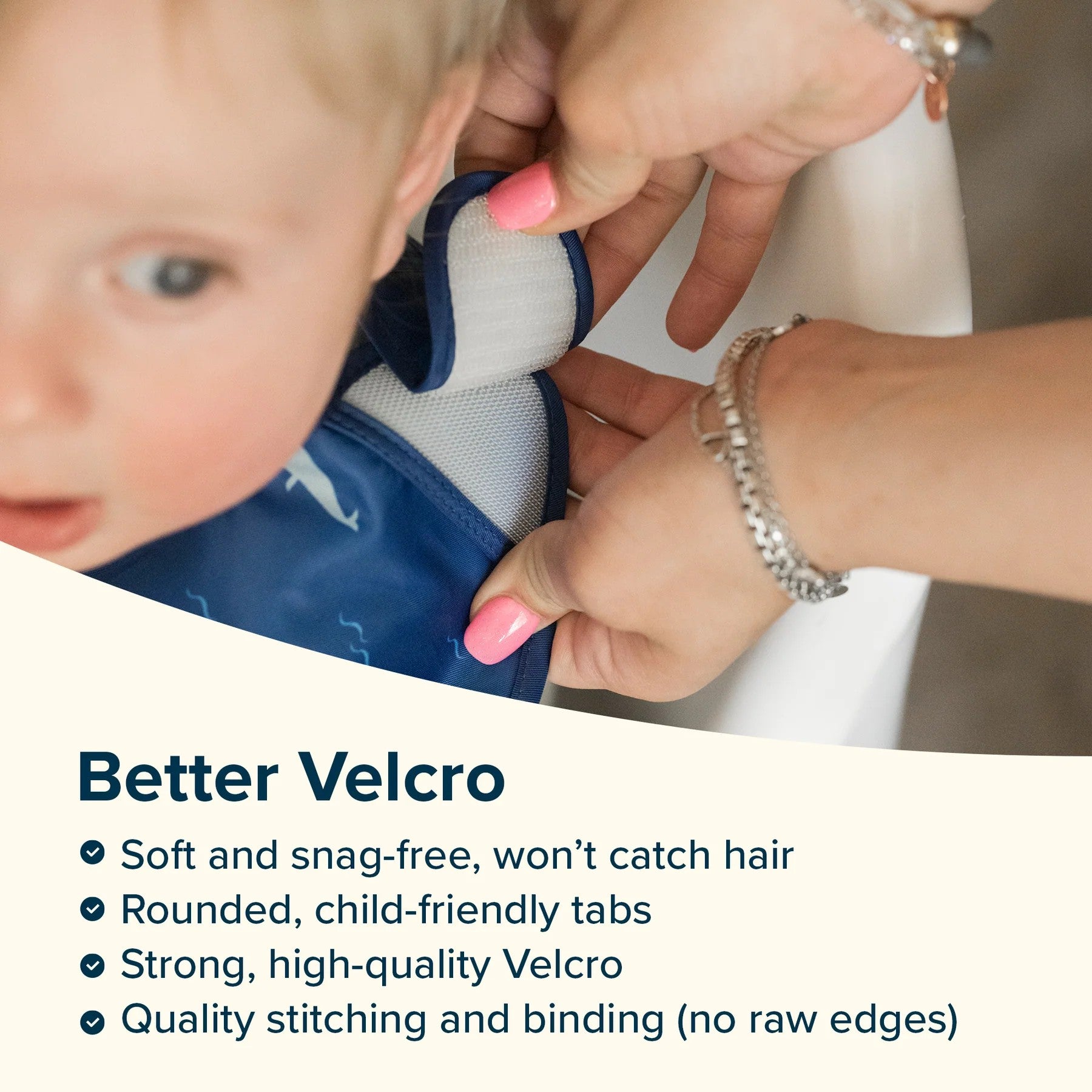 Person adjusting a blue bib with text about better Velcro features.