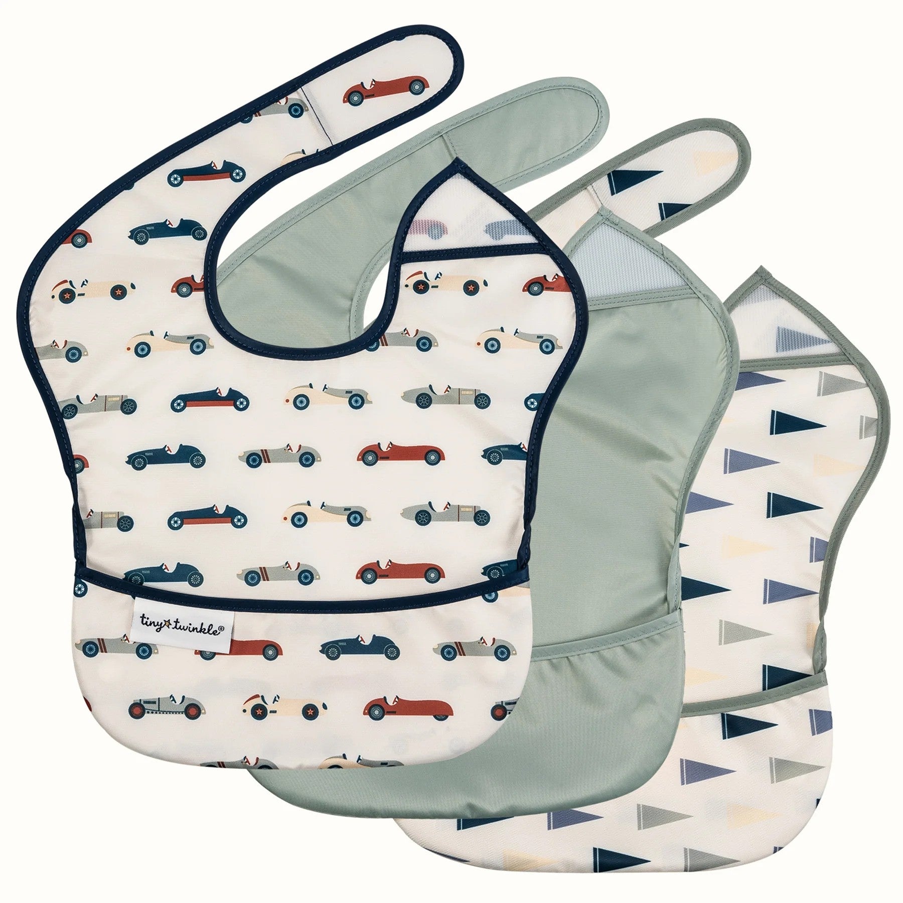 Set of three baby bibs with different patterns on a white background