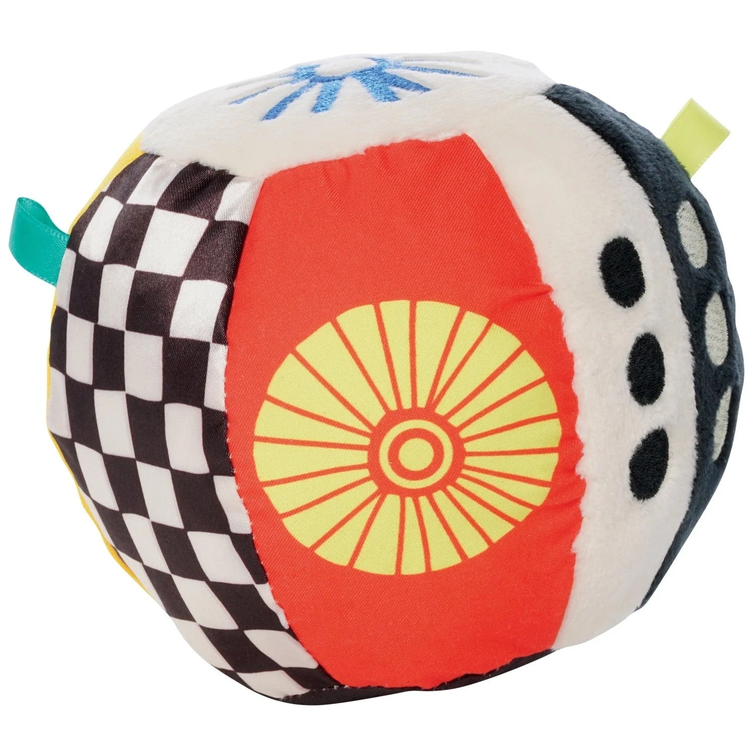 Colorful plush ball with geometric patterns on a white background