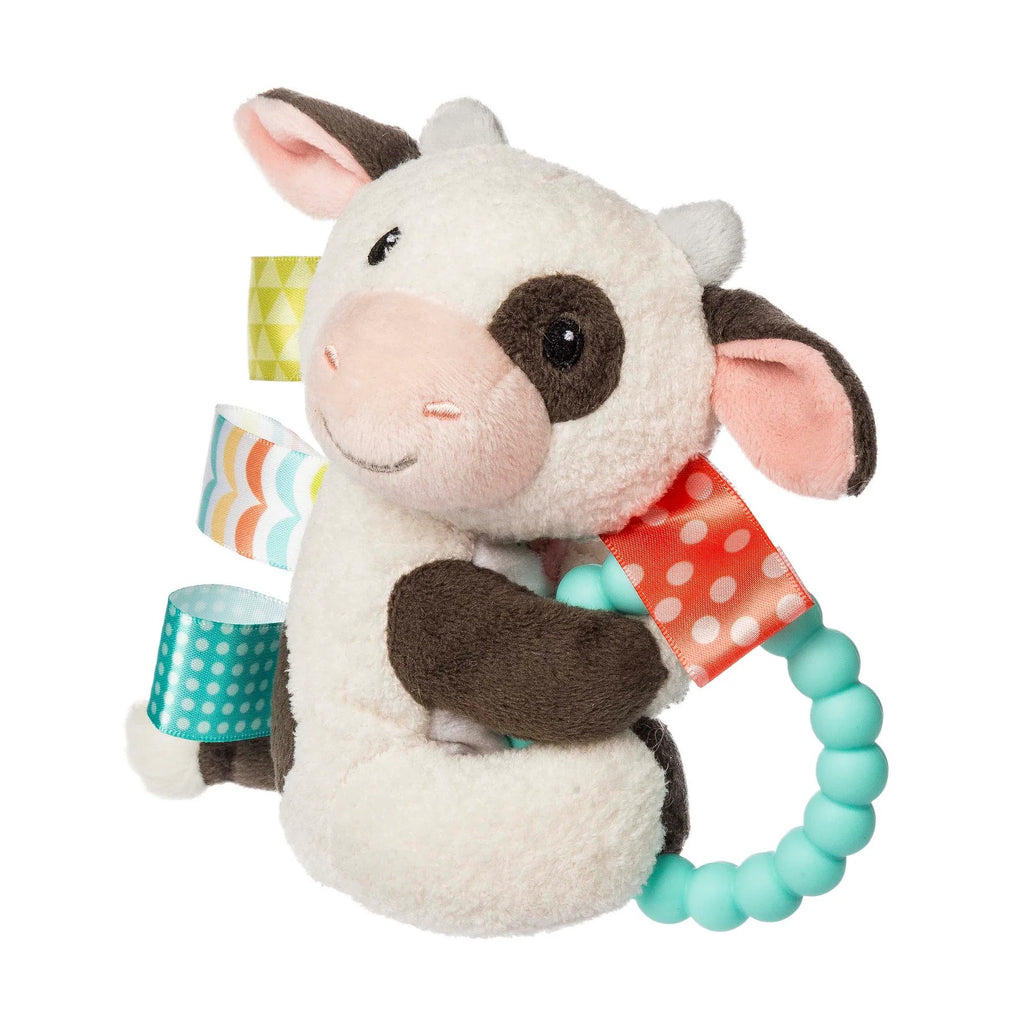 Plush toy with a teething ring on a white background