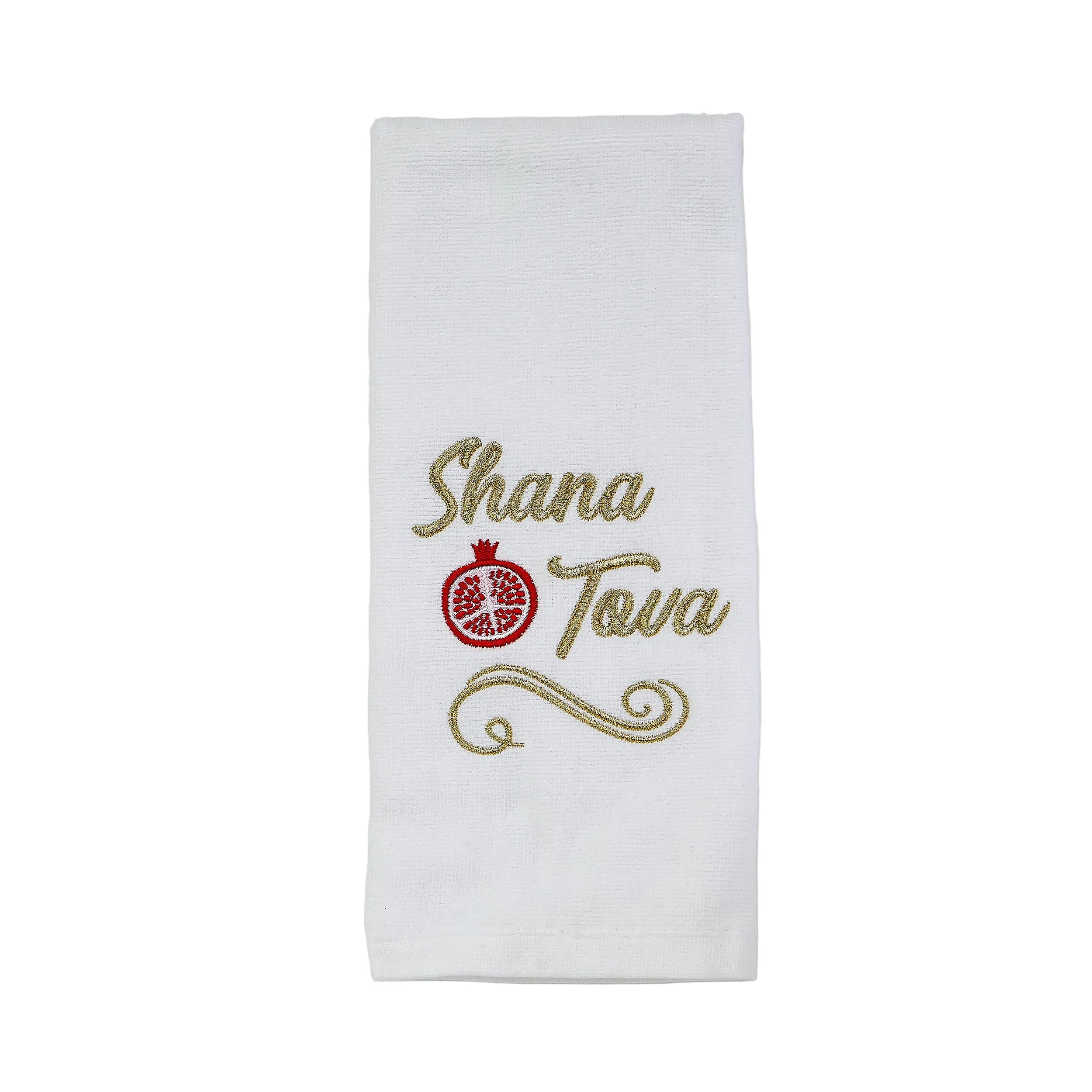 A white fabric tea towel with 'Shana Tova' embroidered in gold thread and a red pomegranate symbol in the center, displayed flat against a light off-white background.