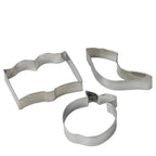 Three stainless steel cookie cutters in different shapes arranged on a plain white surface.