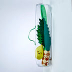Clear plastic bag with Lulav and Etrog toy inside.