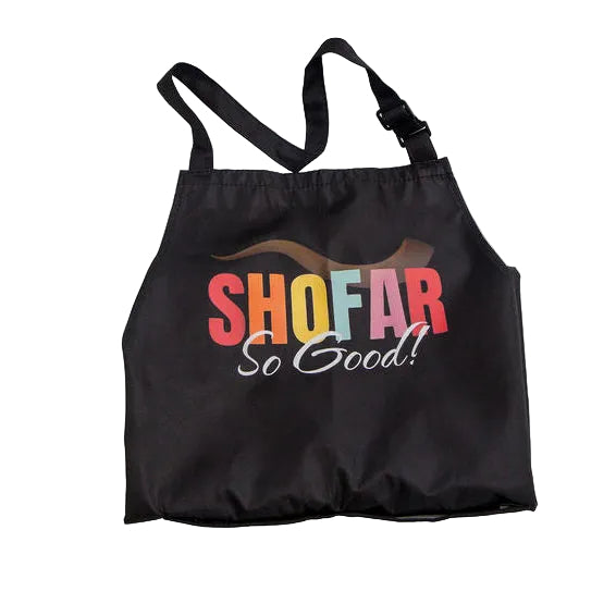 A black drawstring apron with adjustable shoulder straps, featuring a colorful graphic print on the front that reads 'SHOFAR So Good!' in red, orange, yellow, and white lettering, set against a plain white background.
