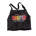 A black drawstring apron with adjustable shoulder straps, featuring a colorful graphic print on the front that reads 'SHOFAR So Good!' in red, orange, yellow, and white lettering, set against a plain white background.