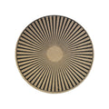 Round placemat with black and beige striped pattern on a white background