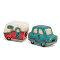 Salt and pepper shakers shaped like a camper and a car on a white background