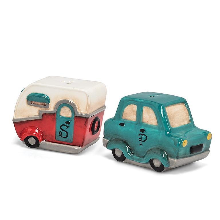Salt and pepper shakers shaped like a camper and a car on a white background