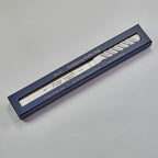 Blue box with a white blade inside on a gray background
