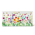 Rectangular white plate with colorful floral design on a white background