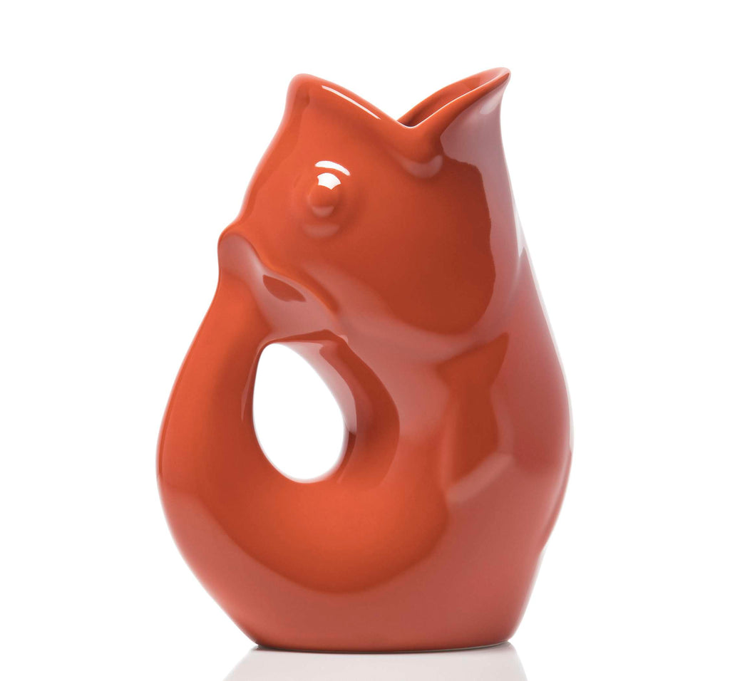 Ceramic fish-shaped vase on a white background