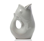 Gray ceramic fish-shaped vase on a white background