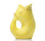 Yellow ceramic fish-shaped vase on a white background
