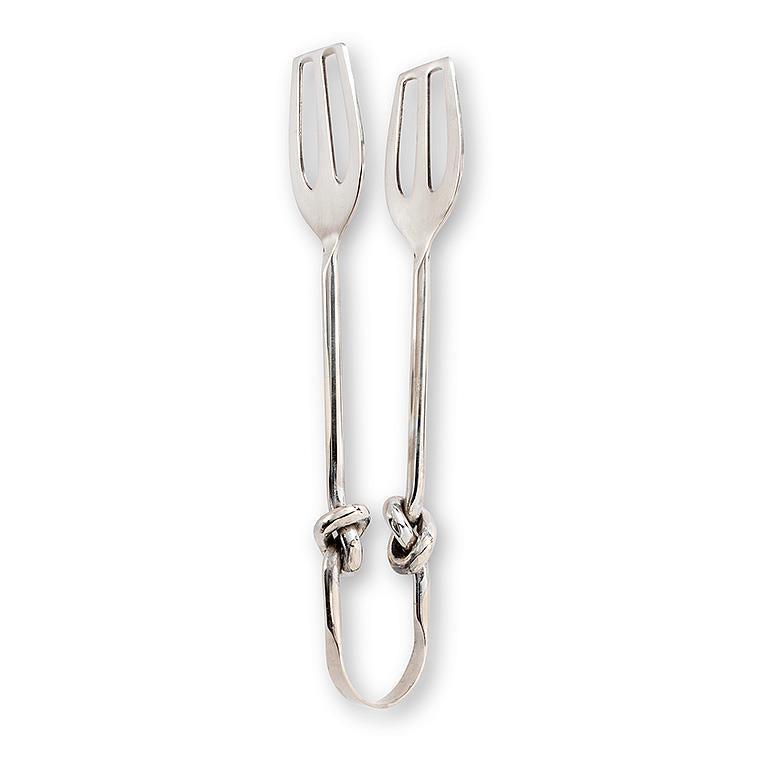 Pair of silver tongs on a white background