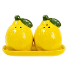 Two lemon-shaped salt and pepper shakers on a matching tray with a white background