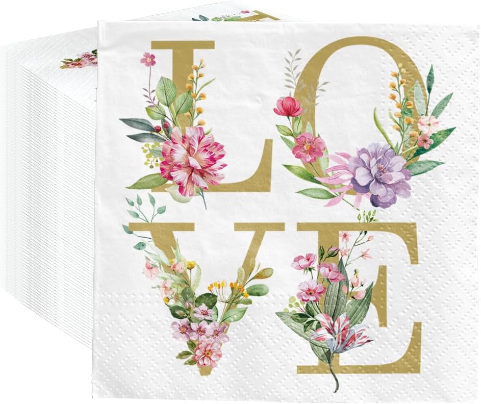 Napkin with floral design spelling 'LOVE' on a white background