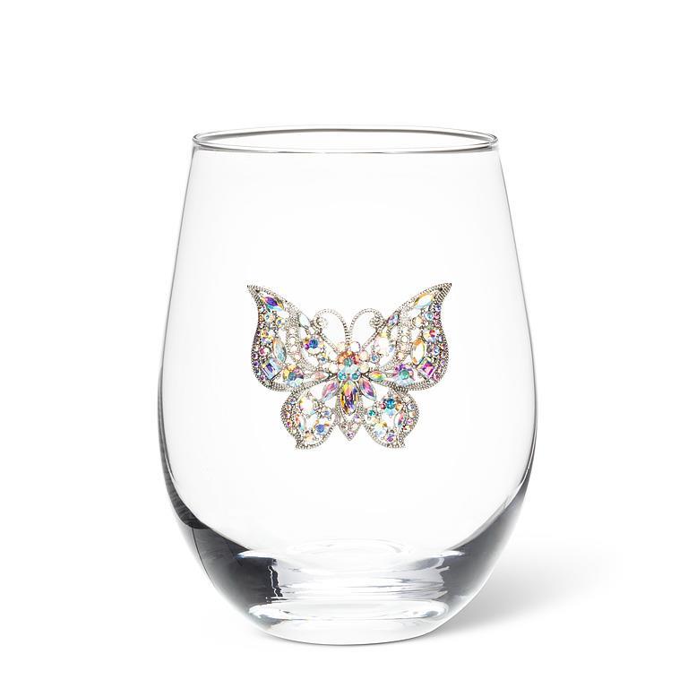 Clear glass with a colorful butterfly embellishment on a white background