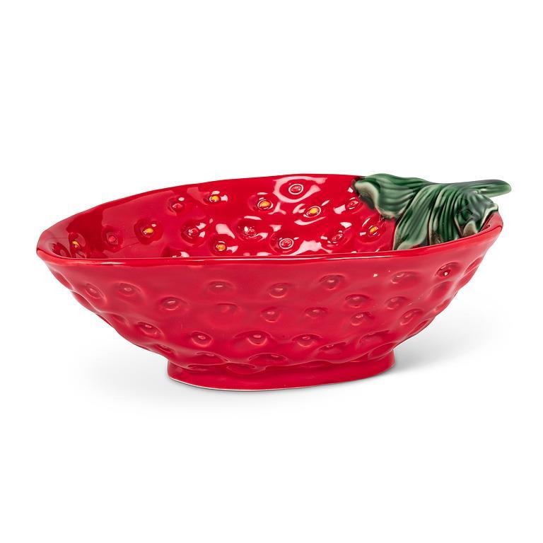 Red ceramic bowl shaped like a strawberry on a white background