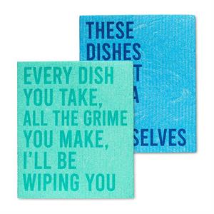 Two blue and green dish towels with humorous text on a white background