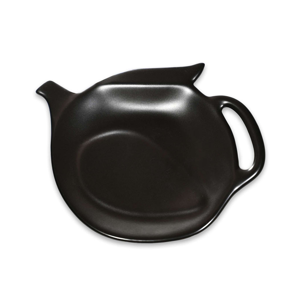 A matte black ceramic teapot-shaped serving dish with a handle on the right and a small spout on the left, shown on a plain white background.