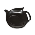 A matte black ceramic teapot-shaped serving dish with a handle on the right and a small spout on the left, shown on a plain white background.