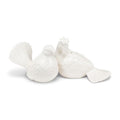 Two white ceramic birds-shaped salt and pepper shakers on a white background