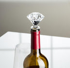 Wine bottle with a diamond-shaped bottle stopper on a neutral background