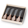 Set of four knives with wooden handles in a box on a white background