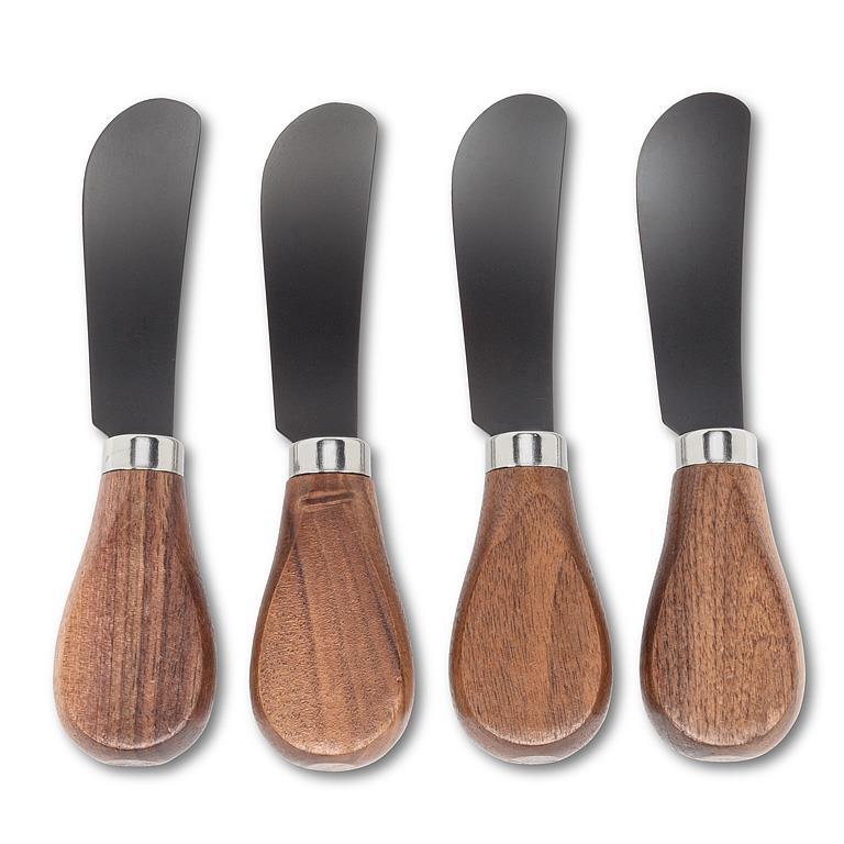 Four butter knives with wooden handles and black blades on a white background
